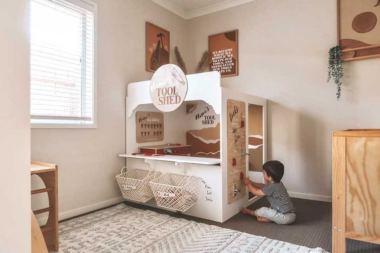 Archie indoor cubby house featuring white walls, timber frame, and pitched roof design for children's play spaces