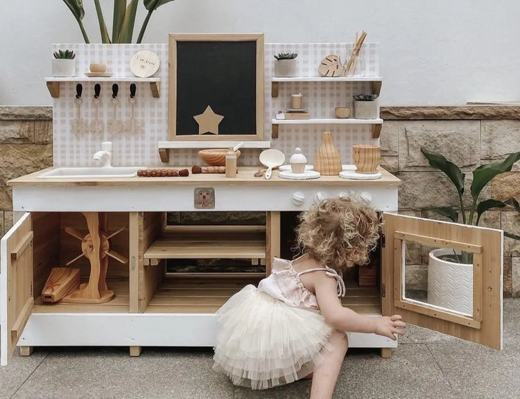 Wooden outdoor mud kitchen playset with shelves, sink area and storage compartments for children's imaginative garden play