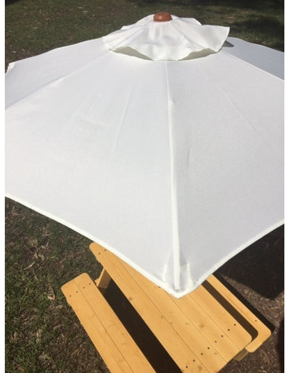 Kids timber picnic table and bench set with umbrella in off-white outdoor setting