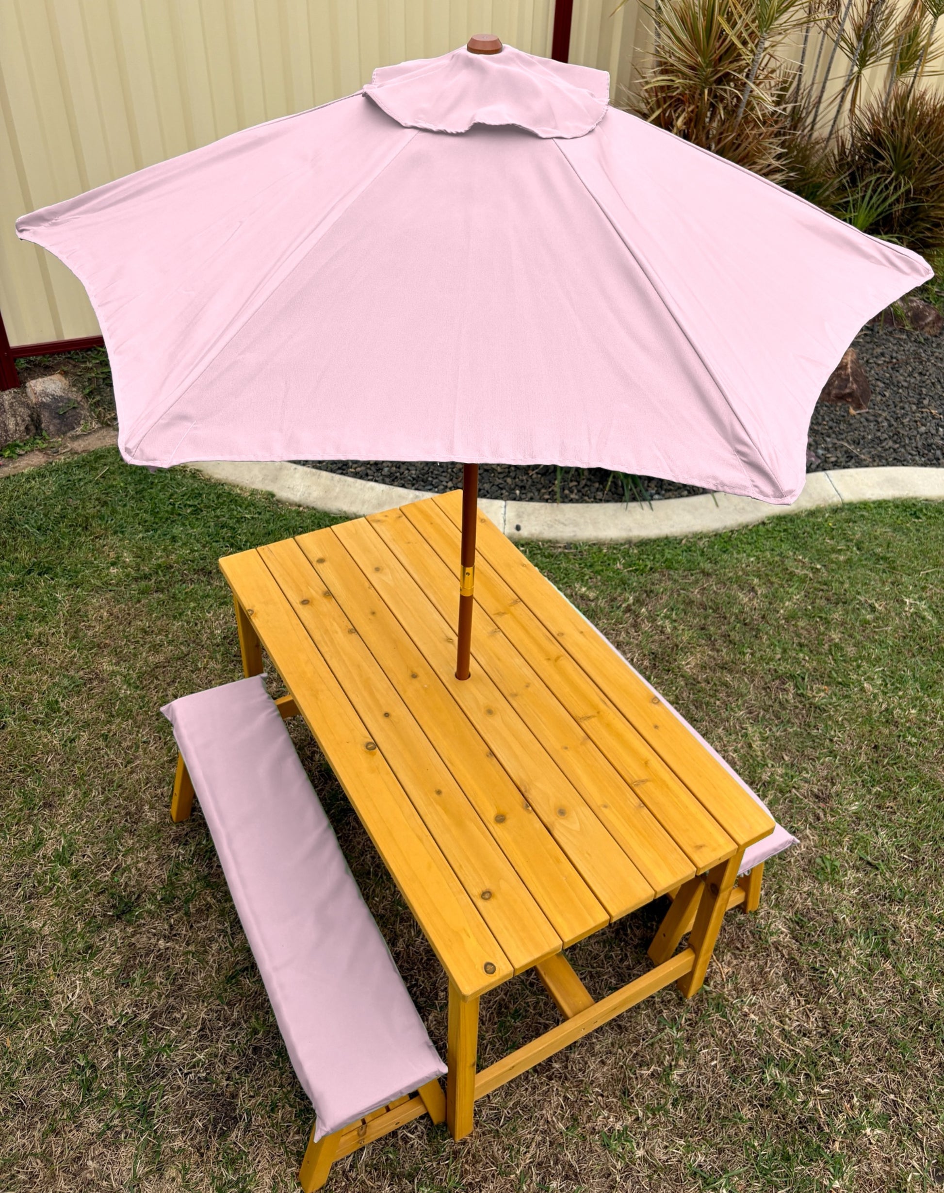 Kids timber picnic table and bench set with umbrella and cushions in baby pink